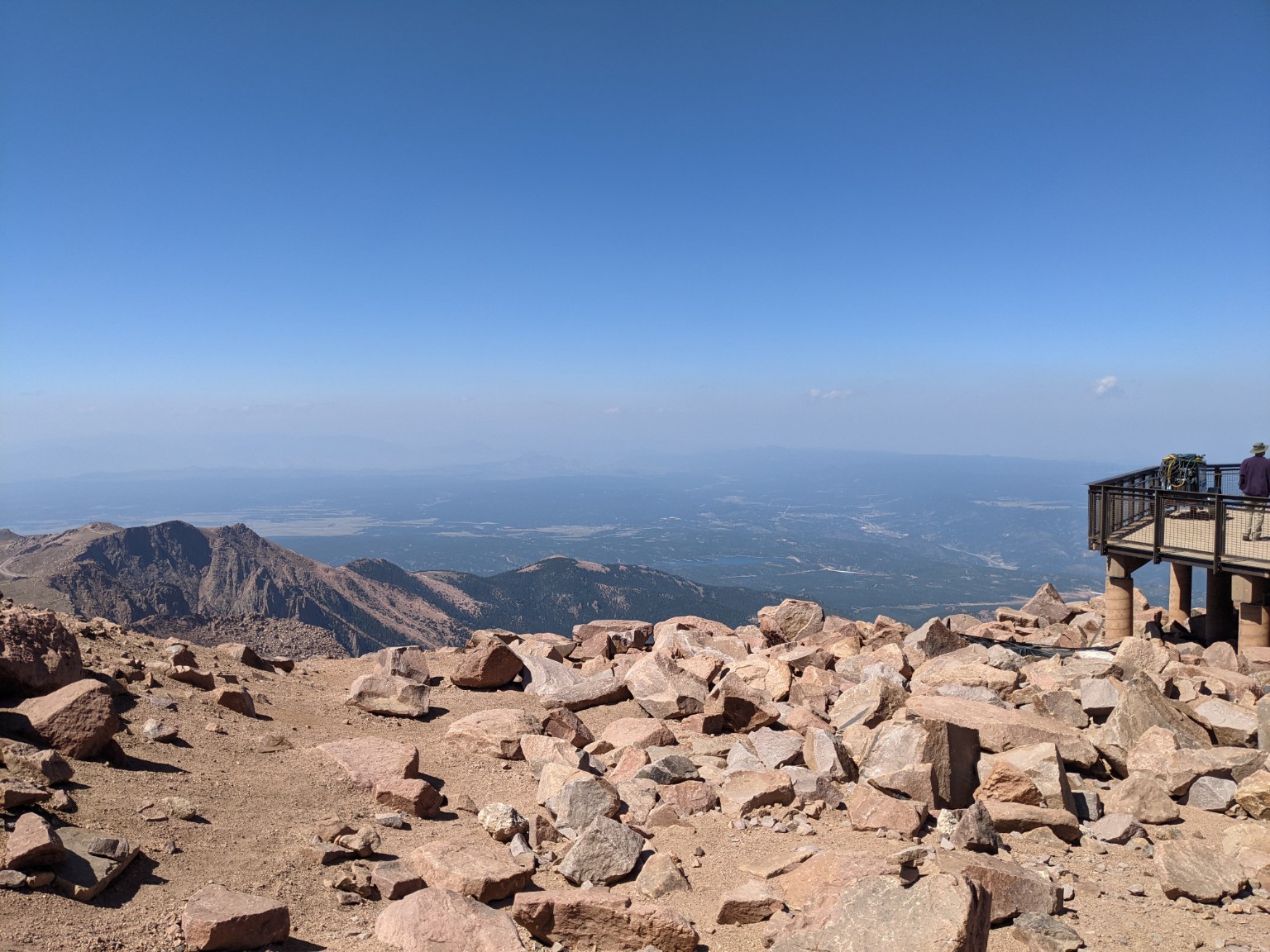 Wide mountain view from a rocky summit